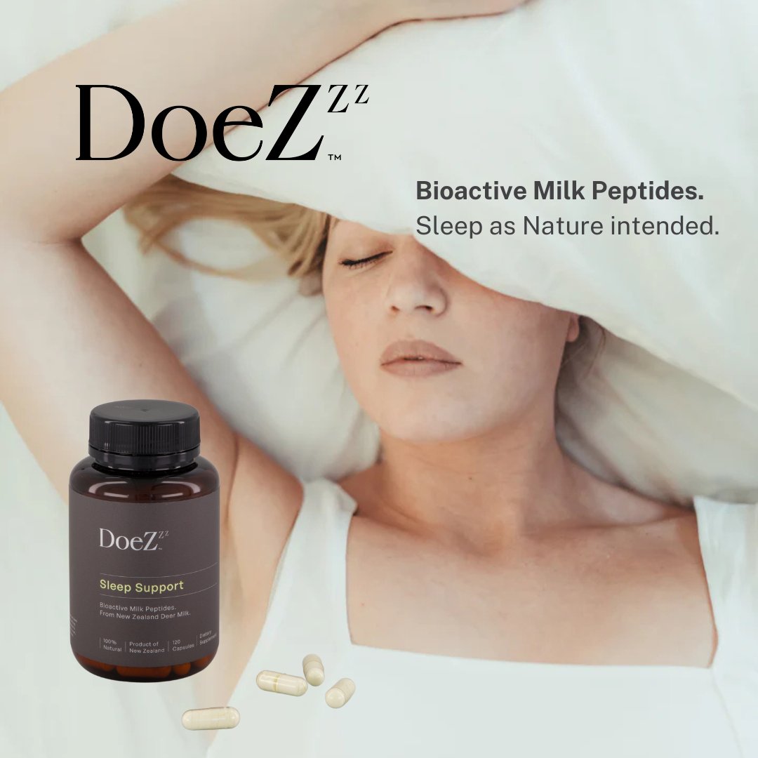 DoeZ Sleep Support Supplement bedside set up with eye mask, cup, DoeZ bottle and capsules