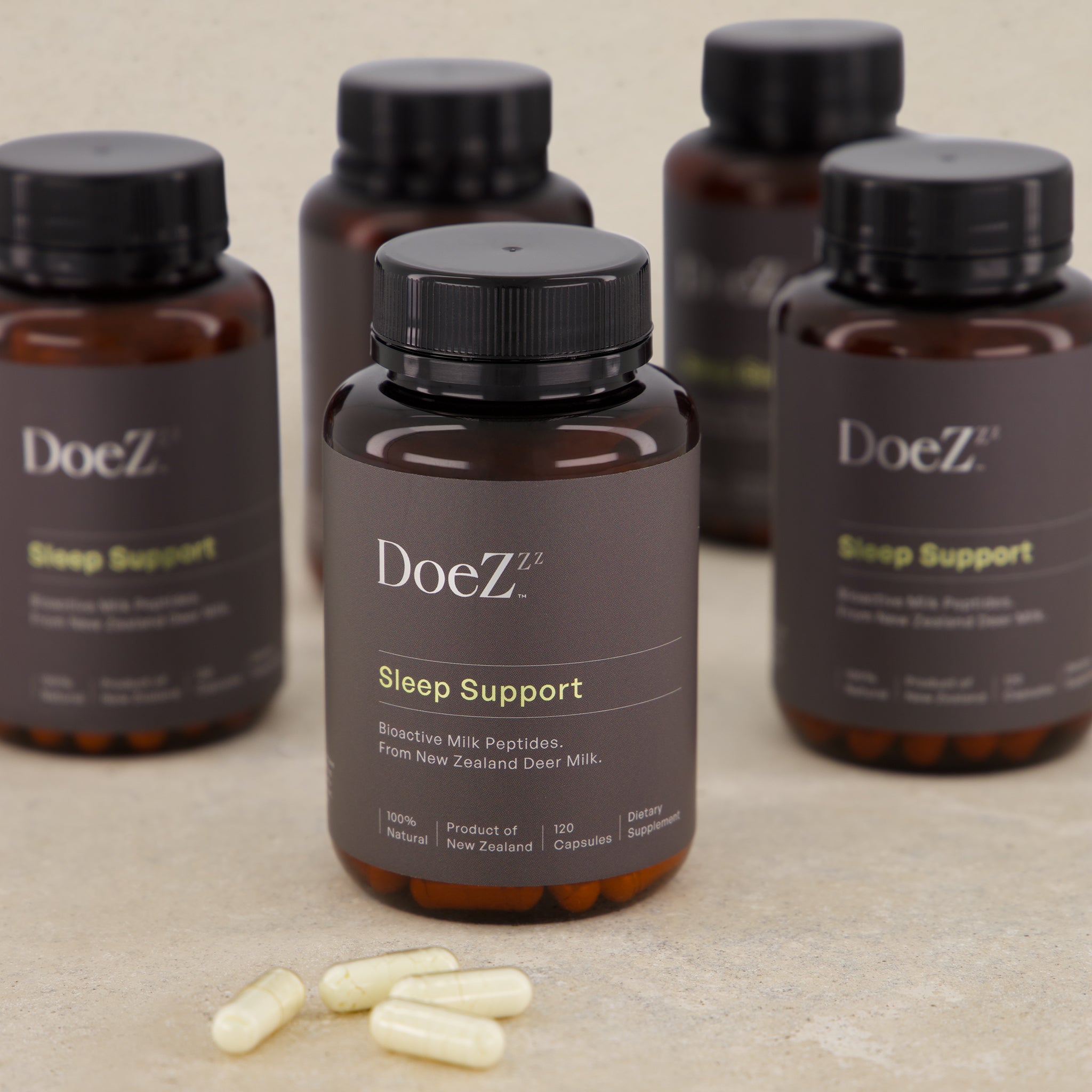 DoeZ Sleep Support supplements with group of capsules bottles